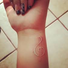 A very creative design of a musical symbol on the wrist. Cool Wrist Music Tattoos For Girls Elegant Arts Tattoo