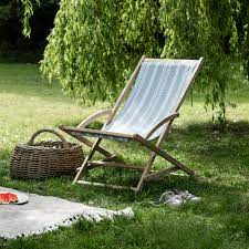Jardin rocking deck chair designed by klaus nolting it's uber contemporary and we love the chicness and minimal appeal. Rocking Deck Chair In Grey Or Blue Stripe Garden Trading