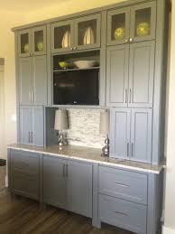 And here's a kitchen from amber interiors that marries the two: Gray Cabinets With Greige Paint Hirshfield S