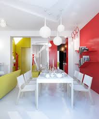 Holly an evergreen plant with prickly dark green leaves and red berries. Red Yellow And White Small Apartment Interior Design Stylish Eve