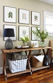 Our Entry Has Definitely Been Through The Ringer And Evolved Over The Years It S Taken A Long Time For Hallway Table Decor Entry Table Decor Foyer Decorating