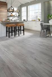 Pin By Mary Smith Sullenberger On Home Sweet Home Living Room Wood Floor Tile Floor Living Room Grey Wood Floors Living Room