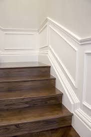 Wainscoting is wood paneling with small vertical strips that are about 1½ inches wide. Makeover Your Staircase With Wainscoting Intrim Mouldings