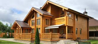 منازل جميلة مصنوعة من الخشب من أي شجرة يقومون ببناء المنازل