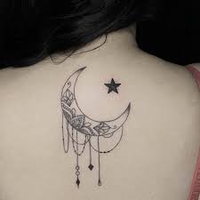 A woman is always a mystery and secret, and this fact is underlined by blue, purple and green shadings. Updated 50 Moon And Star Tattoos For Your Magical Side March 2020