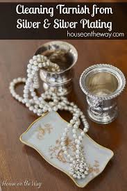 Clean Tarnish From Silver And Silver Plating Cleaning Tarnished Silver Cleaning Hacks Silver Jewelry Cleaner