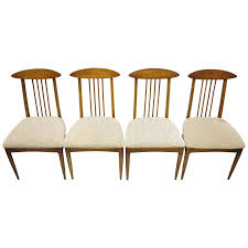 It will enhance the look of the room. Set Of Four Vintage Mid Century Modern Walnut Spindle Back Dining Chairs For Sale At 1stdibs