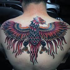 Bird Tattoos For Guys On Back 40 Phoenix Back Tattoo Designs For Men Flaming Bird Ideas Phoenix Back Tattoo Tattoo Designs Men Back Tattoo