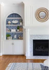 A fireplace usually occupies a large area in the living room. Round Mirror Round Up Driven By Decor