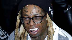 The webs' original & biggest list of celebs and tattooed historical figures, supermodels, sports and rock stars all with tattoos, lots of pictures!. The Meaning Behind Lil Wayne S Tnt Face Tattoo