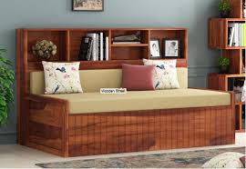 The convertible sofa bed also comes with innerspring coils and foam plates that provide additional support. Sofa Bed Designs Best Wooden Sofa Bed Designs Pictures