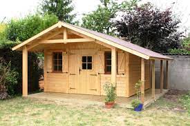 abri de jardin en bois milly 4 00mx4 00m avec bucher et auvent cerisier abris de jardin en bois abri de jardin cabanon de jardin jardins en bois
