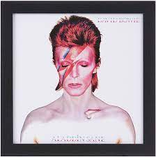 See all of his album covers. David Bowie Acppr48156 Aladdin Sane 12 Album Cover Framed Print Wood Multi Colour 32 X 32 X 1 5 Cm Amazon Co Uk Home Kitchen