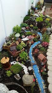 Dry River Bed Landscaping Ideas To Try In 2020 A Nest With A Yard Fairy Garden Plants Fairy Garden Diy Miniature Fairy Gardens