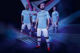 A yellow striped design appears on the top of the right shoulder whilst the etihad airways shirt sponsor is also coloured yellow. Puma X Manchester City Home Away Kits 2019 20 Hypebeast