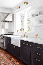 Marble Countertops With Black Lower Cabinets And Gold Hardware Elizabeth Lawson Design Photo Kitchen Decor Inspiration Kitchen Design Kitchen Inspirations