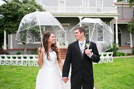 Bride And Groom Each Hold Clear Bubble Umbrella Umbrella Wedding Clear Umbrella Wedding