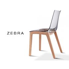 Chaise moderne coque avec rembourrage, revêtement en similicuir skuba ou vintage assise en polypropylène (plastique mat) également disponible, en d'autres teintes coordonné tabouret hauteur 66 cm disponible voir détail. Chaise Coque Pieds Bois Zebra Assise Plastique Transparente Ou Fume Lot De 12 Pieces