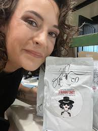 Signing a LOT of postcards and coffee bags to put into y'all's clearance  merch orders from yesterday!! Cannot wait to box these goodies up and send  them to ya!!