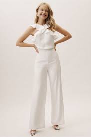 30 White Jumpsuits That Are Cool Bride Approved Rehearsal Dinner Outfits Jumpsuit Fashion Dinner Outfits