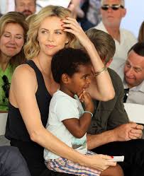 Charlize theron/instagram charlize theron is not usually one to share family photos on social media, but she made a rare exception recently to post a picture of her adopted daughter,. Charlize Theron Adopts Second Child A Daughter Named August Charlize Theron Children Charlize Theron Charlize Theron Hair