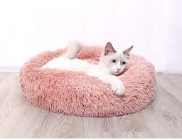 I'm working in my home office with it under my desk they immediately got in and started snoring not even the ups guy at the door disturbed them. Comfy Pet Bed Calming High Stretch Soft Faux Fur For Dogs Cats Comfy Pets Bed In 2020 Dog Pet Beds Cat Bed Best Pet Dogs