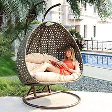 The pergola swing is a handmade wooden garden swing seat made from treated softwood. Amazon Com Island Gale Luxury 2 Person Outdoor Patio Hanging Wicker Swing Chair X Large Latte Rattan Latte Cushion Garden Outdoor