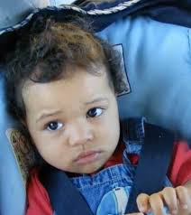 What is the story behind the dark haired baby with a goose?