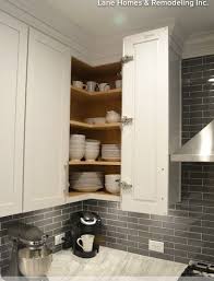Folding Door Makes Upper Corner Cabinets Easily Accessible Corner Kitchen Cabinet Kitchen Design Small Kitchen Cabinets Upper Corner