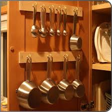 Installation is as easy as sliding the rack on an existing shelf. Measuring Cup Holder On The Inside Of A Cabinet Door Inside Cabinets Kitchen Board Kitchen Storage