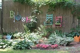 Via they come in multitudes of colors and shapes. Repurposed Items In The Garden Repurposed Items Become Art Diy Garden Fence Fence Decor Garden Wall Art