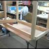 Construct a coffee table of your own that can fold flat and slide behind the couch or into a closet when not it. 1