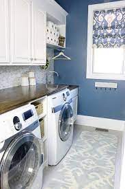 Also, you can add a movable folding table with storage shelves and casters to improve your laundry room design. 13 Laundry Room Makeovers That Will Actually Amaze You Laundry Room Paint Laundry Room Colors Laundry Room Makeover