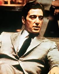 Michael Corleone's transformation is one of the most compelling arcs in  "The Godfather" trilogy. Initially introduced as a war hero who desires to  distance himself from his family's criminal legacy, Michael's journey