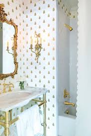 If you have chrome or brushed steel fixtures, polished marble will be perfect on countertops, tub surrounds, and shower walls. 25 Refined White And Gold Bathrooms Digsdigs