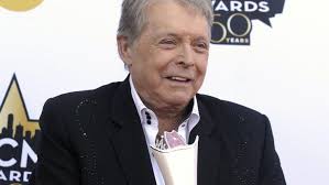 Mickey Gilley, who helped inspire "Urban Cowboy" dies at 86