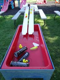 Gutter Ramps For Water Table We Placed Two Gutters On The Table Supported By Some Foam Pads Then We Added Plas Water Play Activities Water Table Water Play