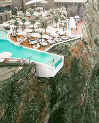 Swimming Pool At The Edge In Bali Sky Pool Hotel Swimming Pool Swimming Pool Designs