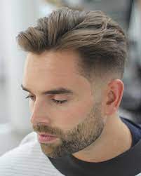 Skin fades can sometimes appear quite intense, especially if the wearer has long hair on the top of his head. 6 Low Fade With Long Textured Top Short Hair With Beard Medium Length Hair Styles Fade Haircut