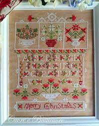 Counted cross stitch patterns cross stitch embroidery flowering trees cross stitch flowers ribbon embroidery flower crafts hobbies and crafts cross stitching flower designs. Cuore E Batticuore Natale Tra I Fiori Christmas Among The Flowers Cross Stitch Patterns Cross Stitch Art Stitch Patterns