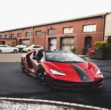 Black And Blue Lamborghini Centenario Lamborghini Centenario Roadster Painted In Rosso Efesto W A Black Central Stripe And Exposed Carbon Fiber Photo Taken By Escarlationffm On Instagram Carros