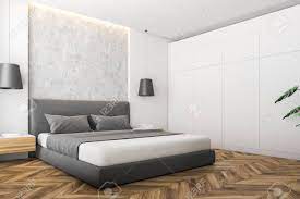 The tendency to have a bedroom with beige partitions is now not related for the reason that 90s. Corner Of Modern Bedroom With White And Stone Walls Wooden Floor Stock Photo Picture And Royalty Free Image Image 117069602