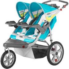 Instep Grand Safari Swivel Wheel Double Jogging Stroller Teal Walmart Com Double Jogging Stroller Jogging Stroller Stroller