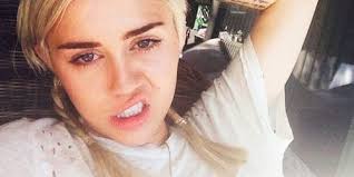 Will Miley Cyrus' Naked Antics Win Liam Hemsworth Back?