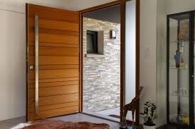 Le Bois Red Cedar Et La Pierre En Parement Entree Maison Moderne Maison En Bois Moderne Portes En Bois Modernes