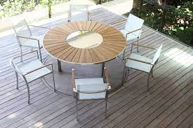 table ronde avec plateau en teck et inox pouvant recevoir 6 a 8 personnes plateau central tournant pour meubles de patio table contemporaine mobilier jardin