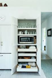 Farmhouse kitchen pantry with light gray shaker cabinets. 42 Pros Cons Of Kitchen Pantry Storage Cabinet That You Want Your Home To Have At This Moment Kitchen Boards Pictures