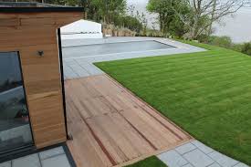 A Stunning Contemporary Garden Complete With Garden Room Swimming Pool Hot Tub And Infinity Lawn Family Garden Contemporary Garden Garden Room