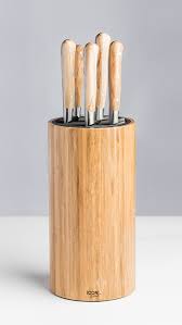 3.5 paring knife, 5 utility knife, 7.5 santoku knife, 8 slicer knife, 8 chef knife; Round Universal Knife Block Icon Chef