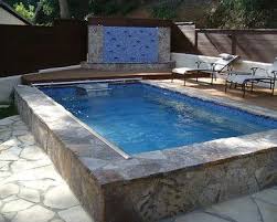 A Beautiful Endless Pool Surrounding Catch Some Rays Then Take A Dip For Refreshing Exercise Endless Pool Modern Landscape Design Simple Pool